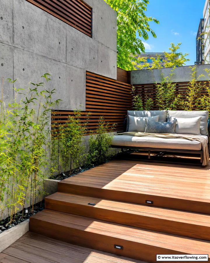 Raised Patio with Privacy Wall - 25 Raised Concrete Patio Ideas for a Modern Outdoor Space