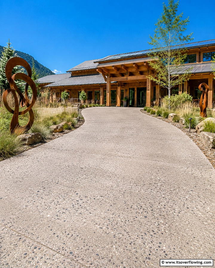 Reclaimed Material Concrete Driveway - 30 Durable Concrete Driveway Designs to Enhance Curb Appeal