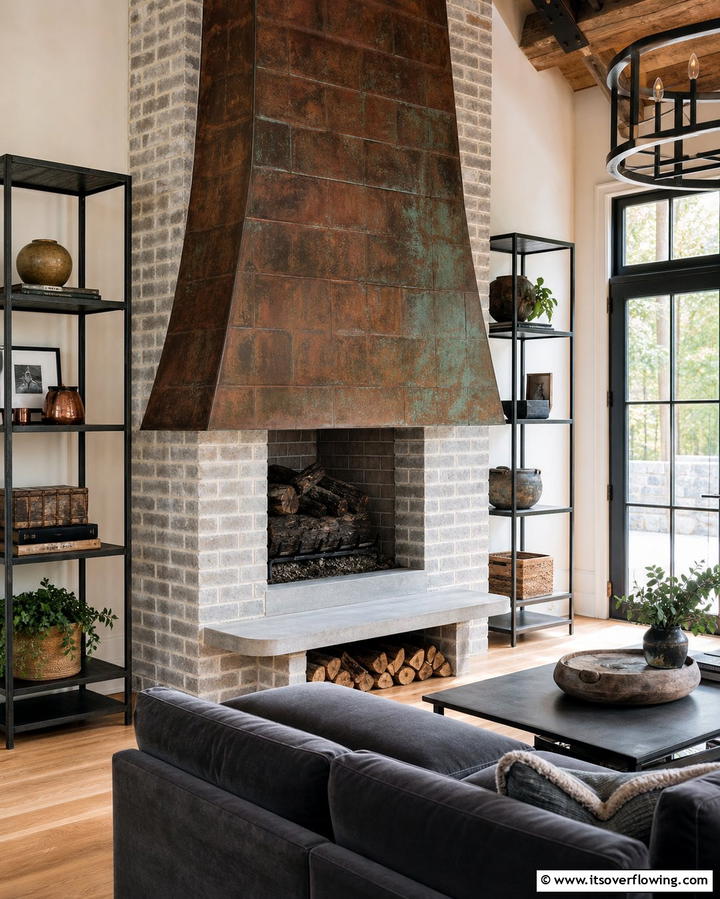 Rustic Brick Fireplace with Rustic Metal Hood - 25 Rustic Living Room Ideas with a Brick Fireplace