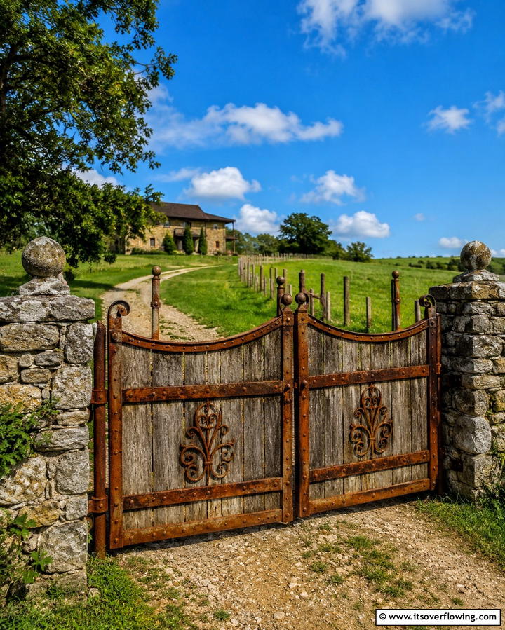 Rustic Farmhouse Style Metal Gate - 25 Metal Garden Gate Ideas to Enhance Your Outdoor Space