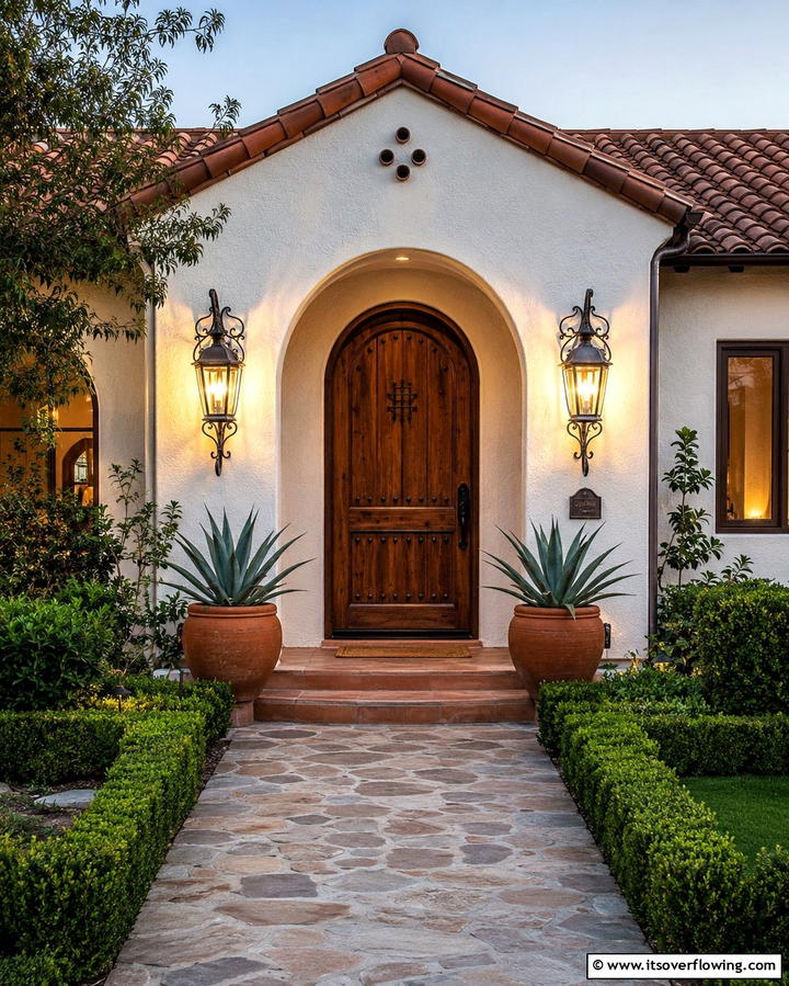 Rustic Iron Lighting - 30 Spanish Bungalow Exterior Ideas for Mediterranean Charm