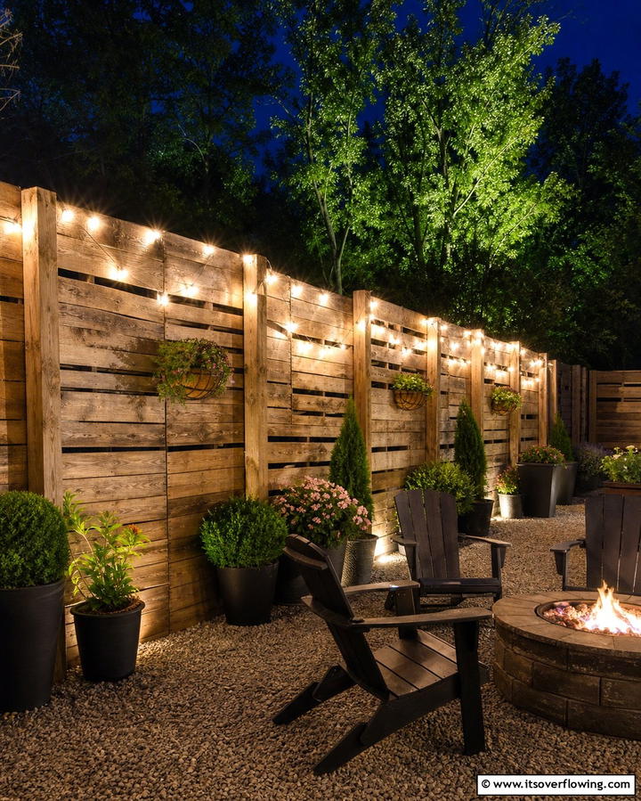 Rustic Pallet Fence with Lights - 25 Pallet Fence Ideas for Eco-Friendly Landscaping