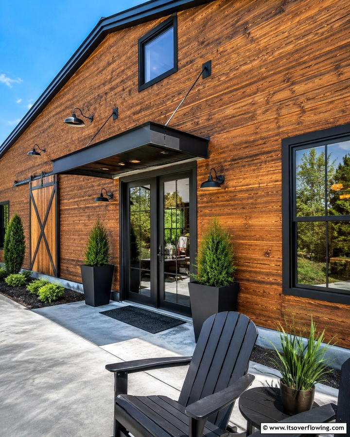 Rustic Wood Paneling with Modern Accents - 30 Pole Barn & Barndominium Exterior Designs for Rustic Charm