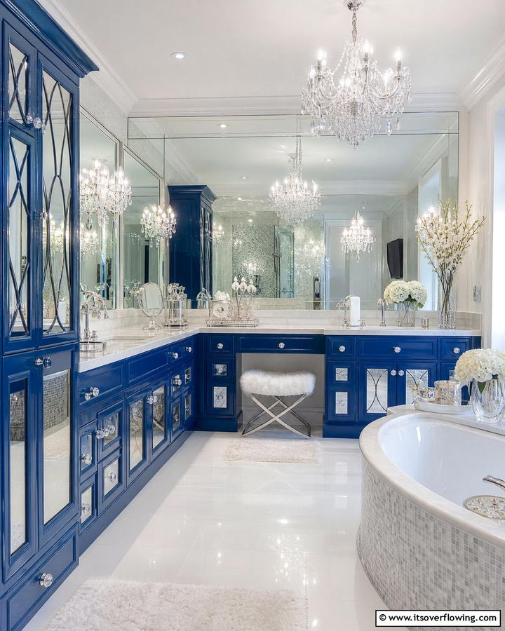Sapphire Blue Vanity with Mirrored Accents - 25 Stunning Blue Bathroom Vanity Ideas