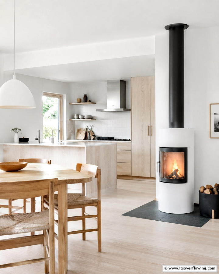 Scandinavian Kitchen with a Compact Fireplace - 25 Kitchens With Fireplaces for a Unique Cooking Space