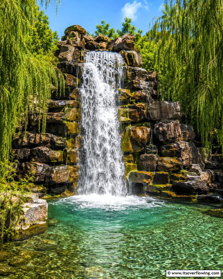 Serene Rock Waterfall - 25 Rock Landscaping Ideas to Transform Your Outdoor Space