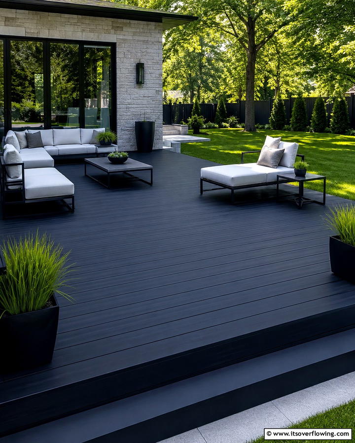 Sleek Black Deck with Minimalist Furniture - 25 Black Deck Ideas for a Bold Outdoor Statement