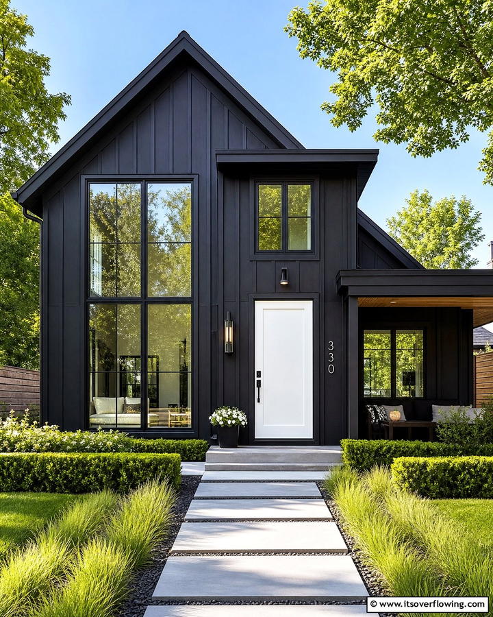 Sleek Black Sophistication - 21 Exterior House Color Schemes for Curb Appeal