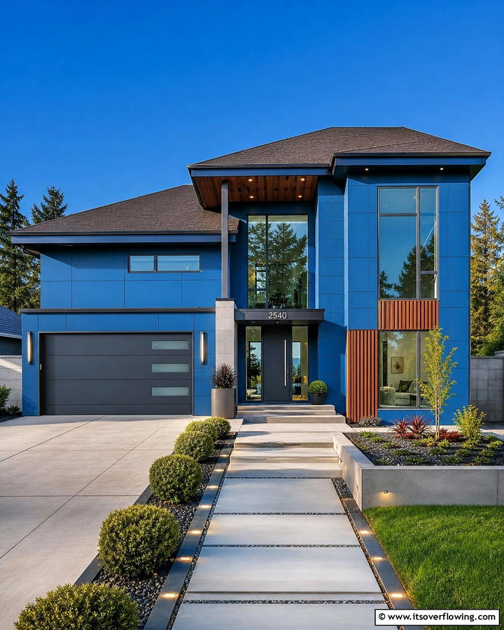 Sleek Contemporary Design with Blue Panels and Brown Roof - 25 Stunning Blue Exterior Home with Brown Roof Ideas