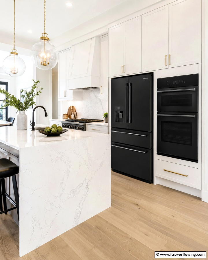 Sleek Contrast with White Cabinets - 25 Kitchen With Black Appliances for a Sleek and Modern Look
