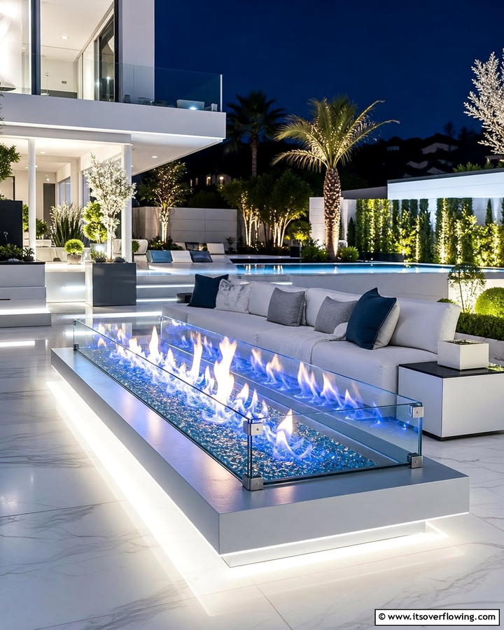 Sleek Glass Enclosure - 21 Fire Pit Ideas for Outdoor Gatherings and Cozy Nights