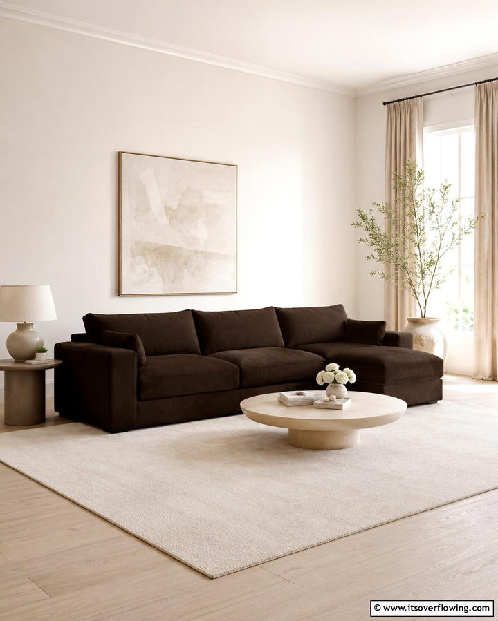 Soft Neutrals to Highlight the Couch - 30 Warm Dark Brown Couch Styling Ideas for Cozy Living Rooms