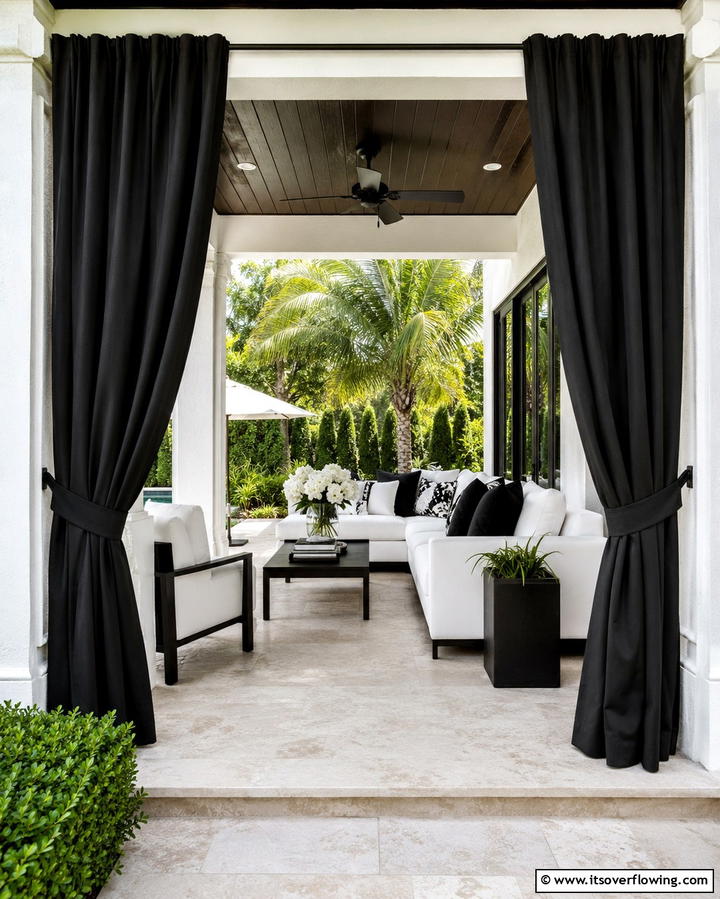 Sophisticated Black Outdoor Curtains - 30 Inviting Black Porch Ideas for a Modern Outdoor Oasis
