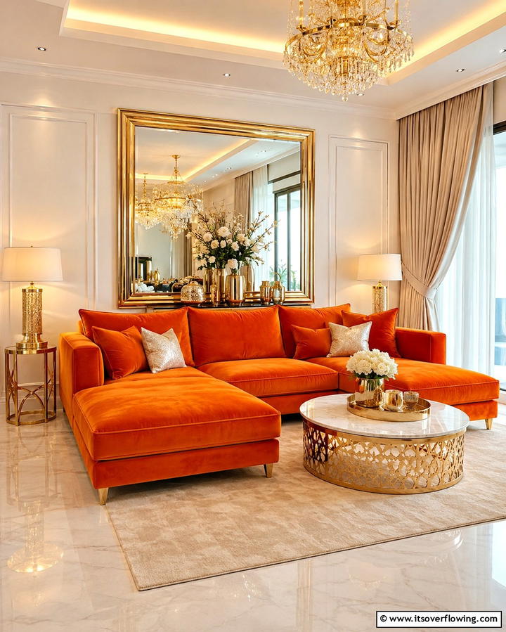 Sophisticated Glam with Gold Accents - 25 Orange Couch Living Room Ideas for a Vibrant Space