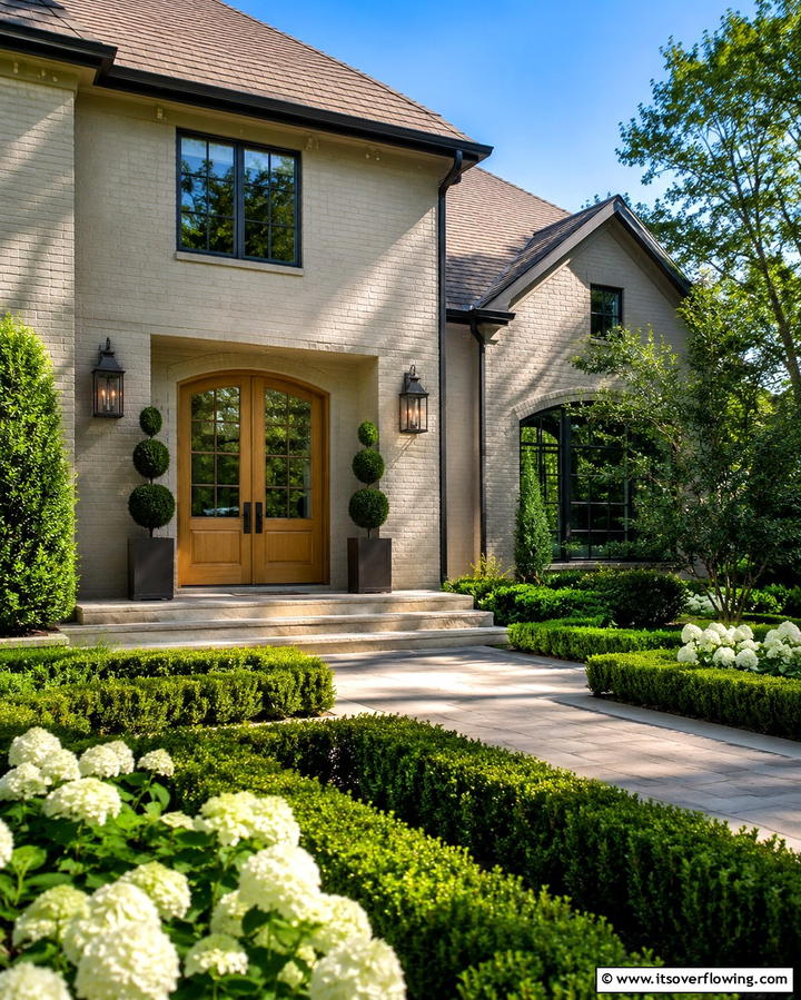 Sophisticated Greige Painted Brick - 25 Painted Brick Houses Ideas for a Fresh Look