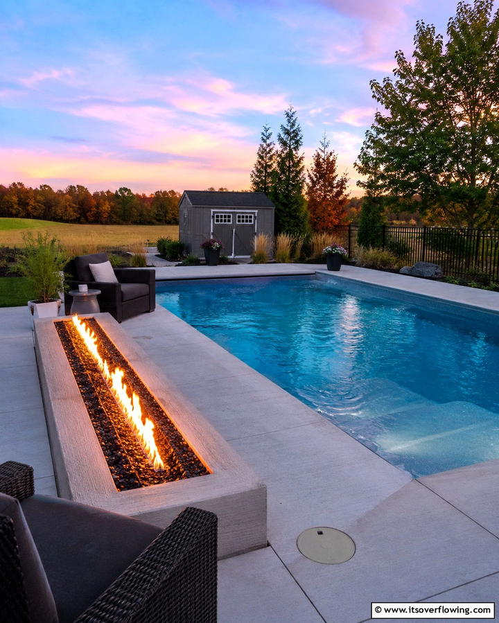 Spool Pool with Fire Feature - 25 Spool Pool Ideas for Compact Backyard Spaces