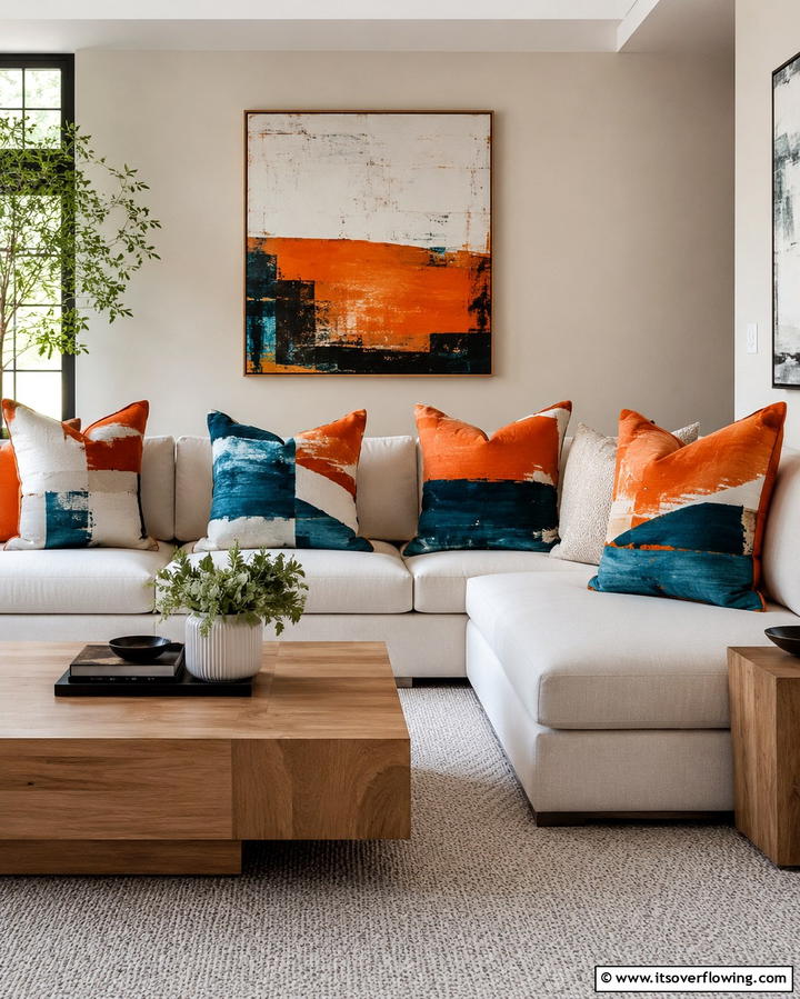 Statement Cushions - 25 Orange and Blue Living Room Ideas for a Bold Look