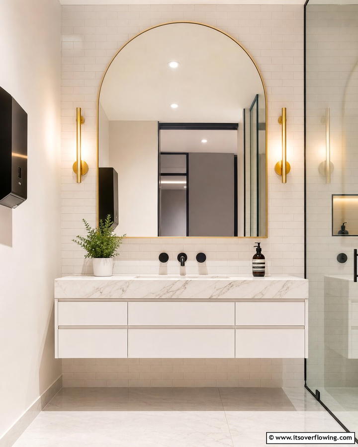 Statement Mirrors for Style - 20 Office Bathroom Ideas for a Functional and Stylish Space