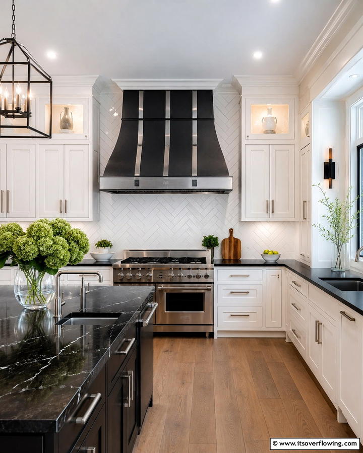 Statement Range Hood - 25 Kitchen With White Cabinets and Black Countertops Ideas