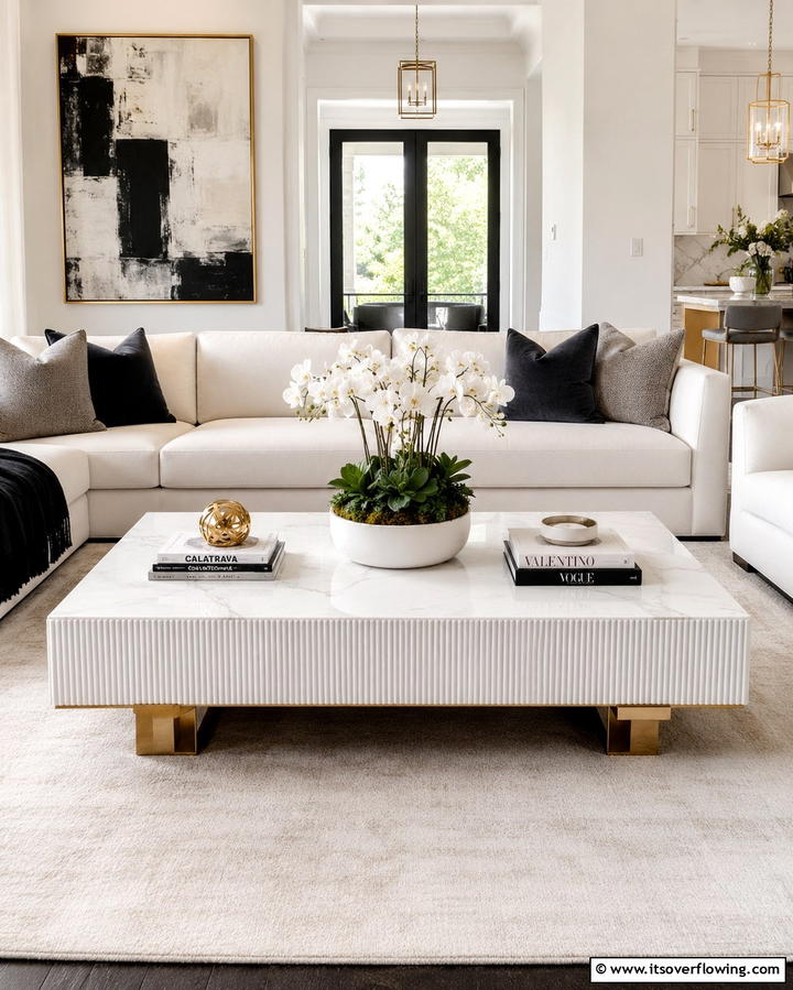 Statement White Coffee Table - 25 White Living Room Ideas for a Timeless Look
