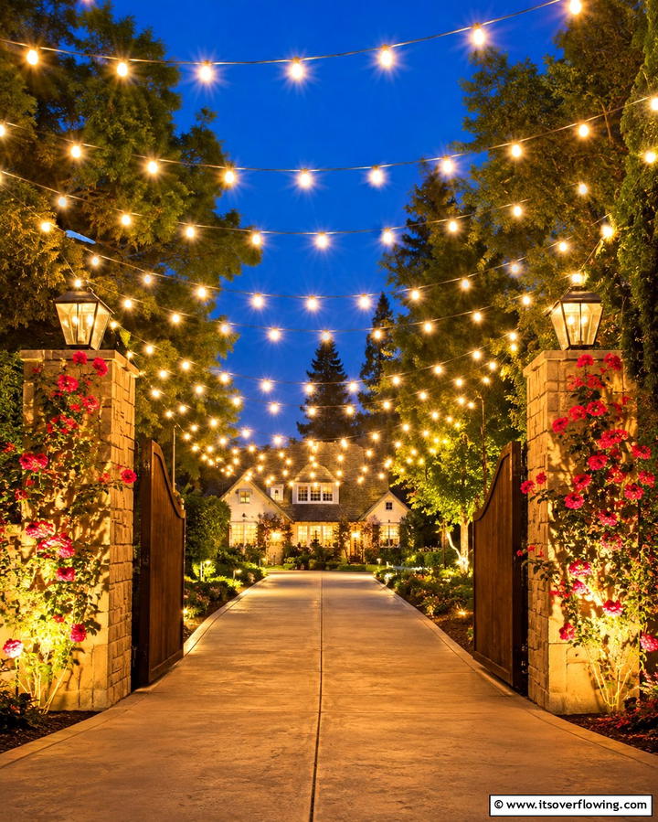 String Lights Across Driveway Entrances - 25 Driveway Lighting Ideas to Illuminate Your Home