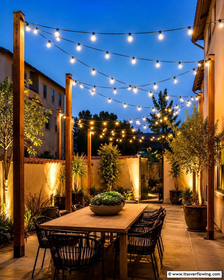 String Lights for Atmosphere - 30 Space-Saving Townhouse Backyard Design Ideas