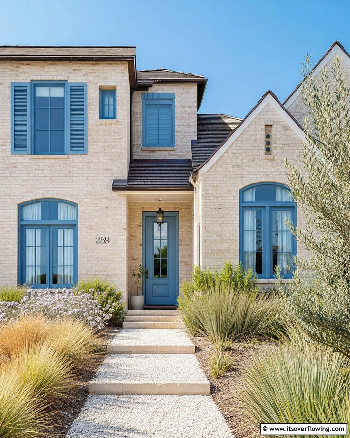 Subdued Brick Beige with Cool Blue Accents - 30 Exterior Brick and Paint Color Combinations