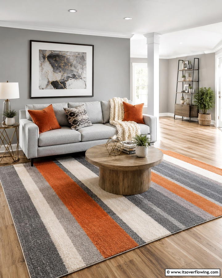 Subtle Orange Patterns on Grey Upholstery - 25 Orange and Grey Living Room Ideas for a Modern Look