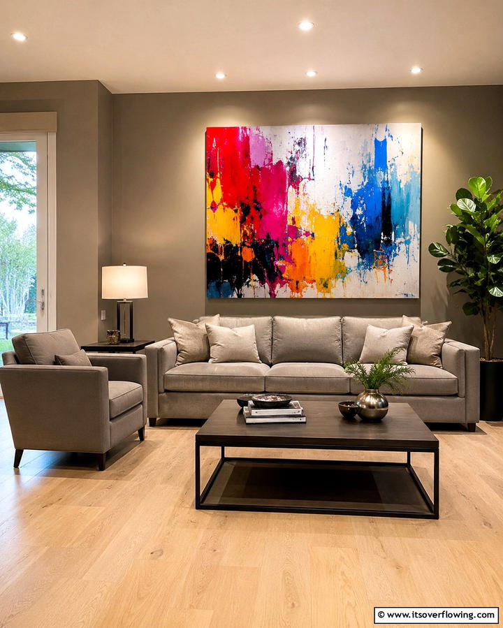 Taupe Furniture with Bold Artwork - 20 Taupe Living Room Ideas for a Neutral Aesthetic