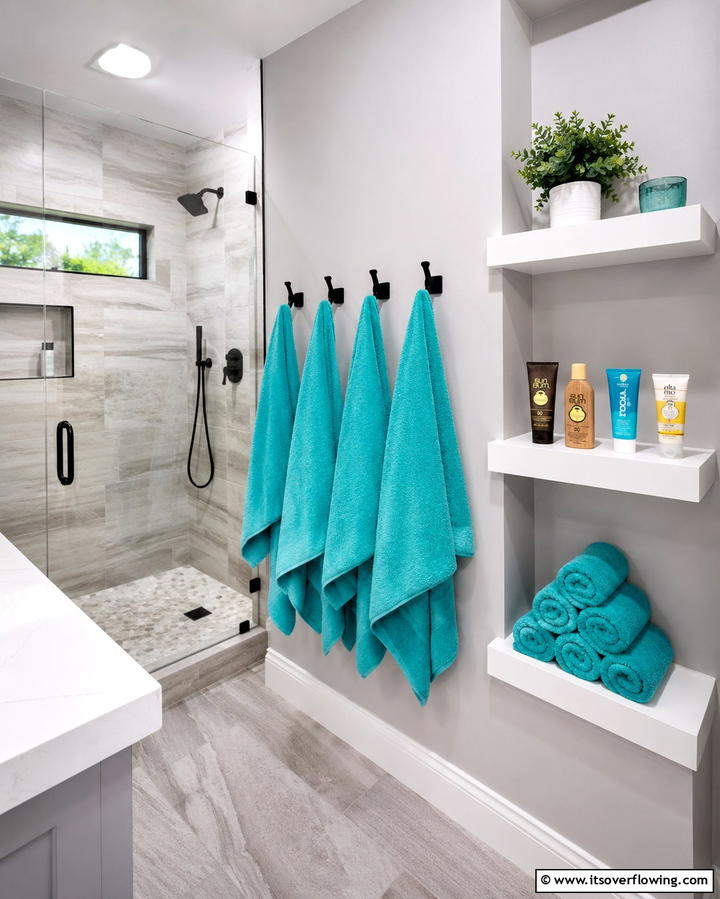 Towel Hooks and Storage - 25 Pool Bathroom Ideas for a Refreshing Swim Experience