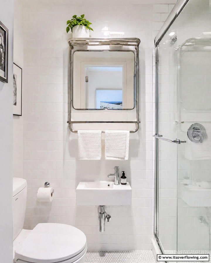 Towel Rack with Integrated Mirror - 30 Towel Storage Ideas for Organized and Stylish Bathrooms