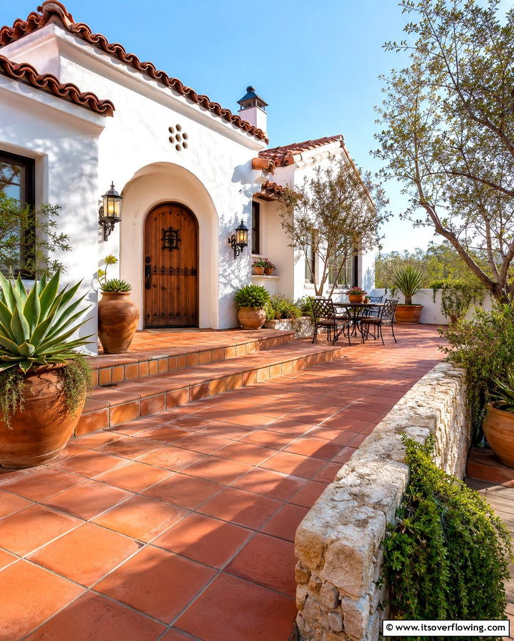 Traditional Terracotta Flooring - 30 Spanish Bungalow Exterior Ideas for Mediterranean Charm