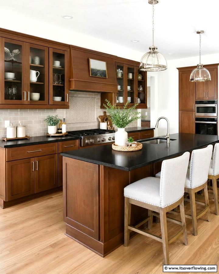 Transitional Style with Subtle Elegance - 25 Brown Kitchen Cabinets With Black Countertops