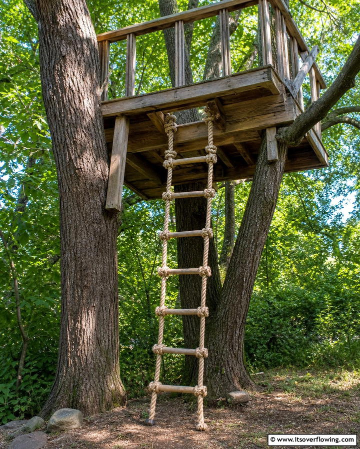 Treehouse with Rope Ladder Access - 25 Tree House Ideas for Magical Outdoor Adventures