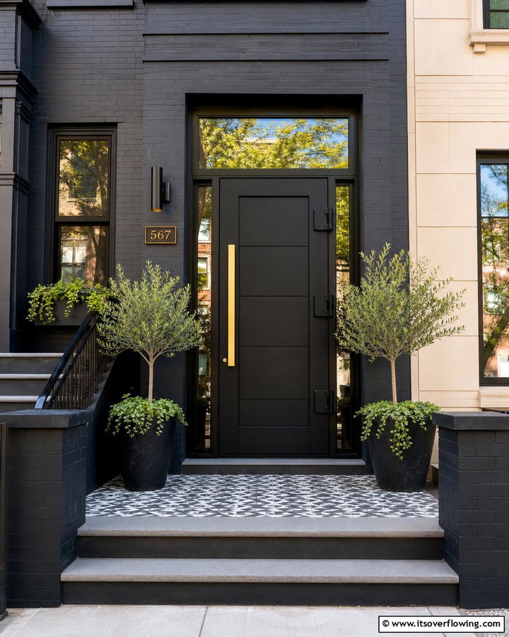 Urban Black with Bold Hardware - 21 Black Front Door Ideas for Bold First Impressions