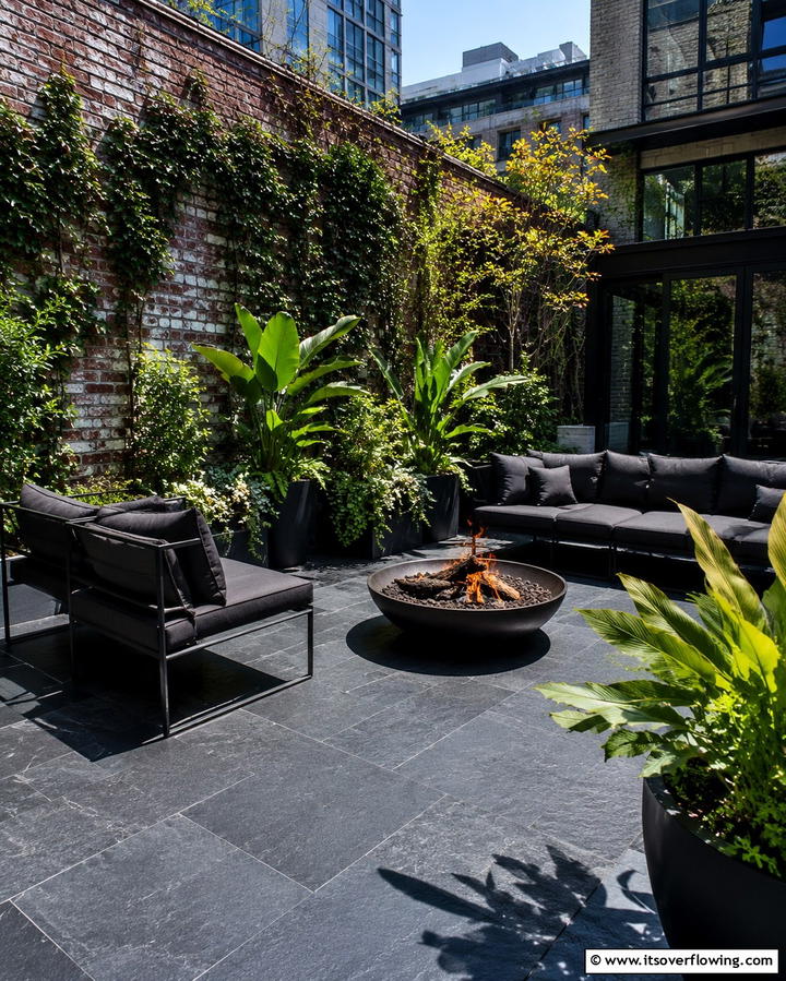 Urban Loft Style with Dark Stones - 20 Stone Patio With a Fire Pit Ideas for Cozy Nights