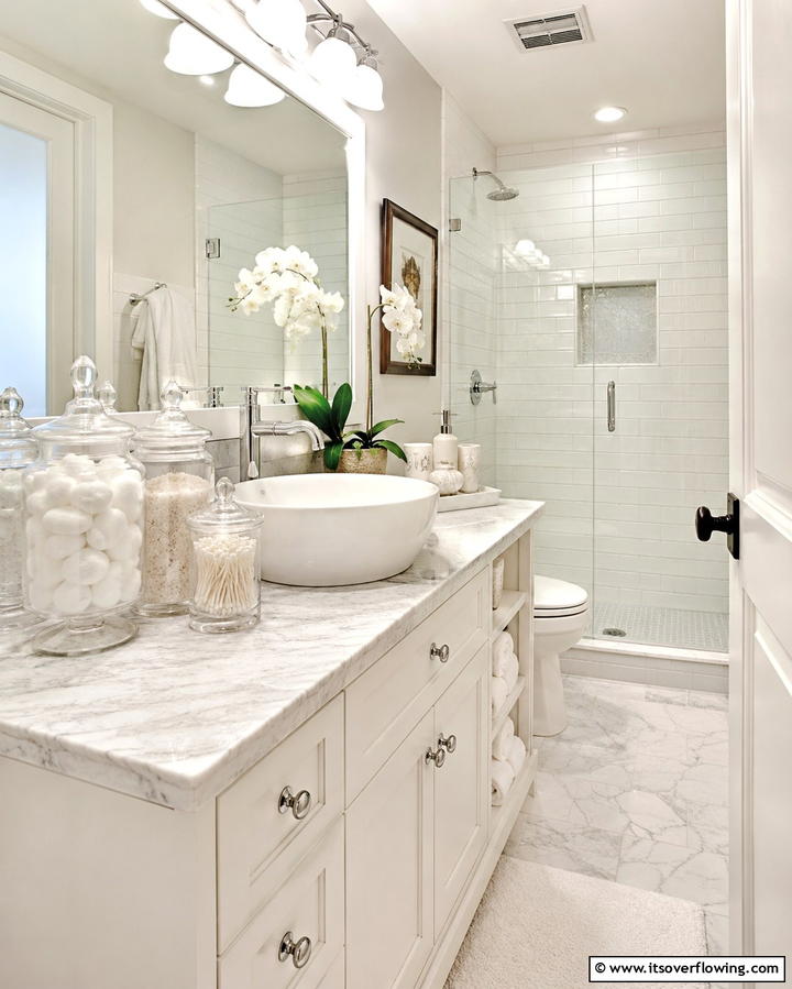 Use Decorative Storage Jars - 25 Bathroom Staging Ideas to Sell Your Home Faster