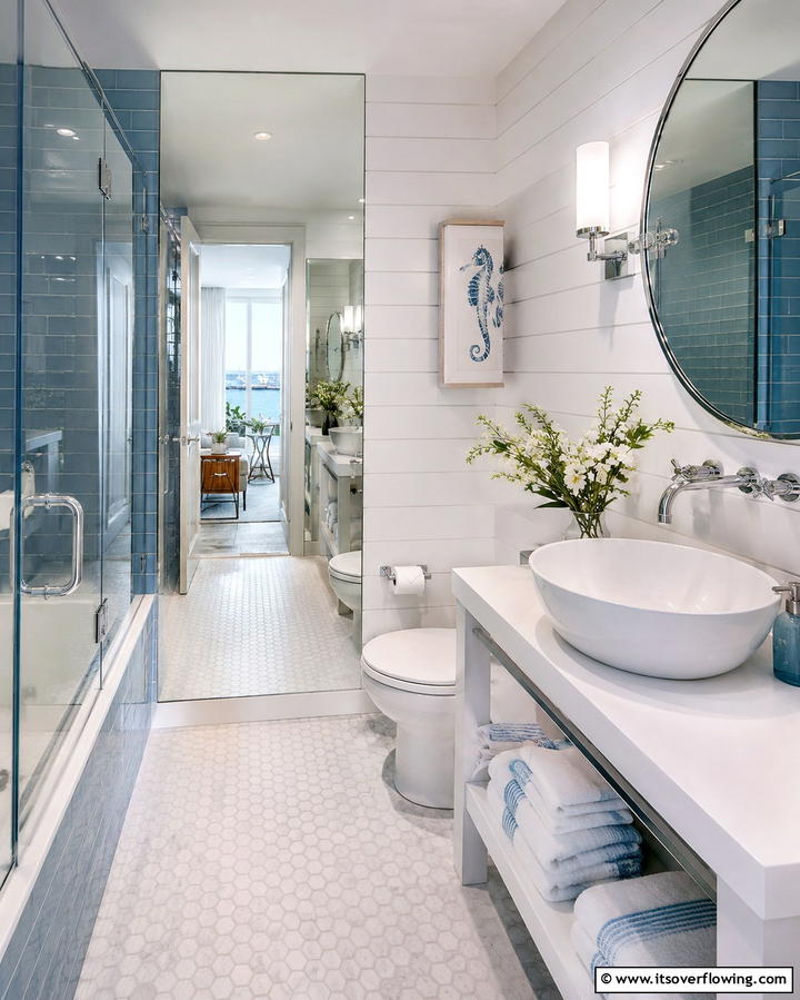 Use Mirrors to Enhance Light - 25 Apartment Bathroom Ideas to Maximize Small Spaces