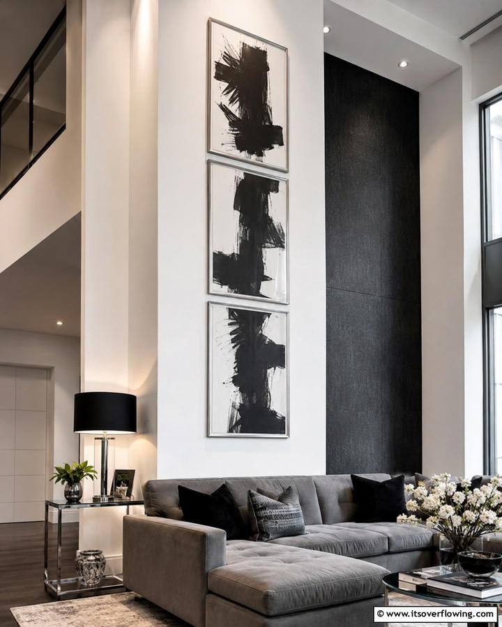 Use Vertical Artwork Displays - 30 Space-Saving Condo Living Room Ideas for Urban Dwellers