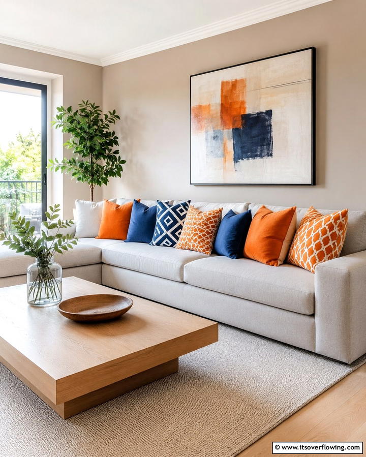 Vibrant Throw Pillows - 25 Orange and Blue Living Room Ideas for a Bold Look