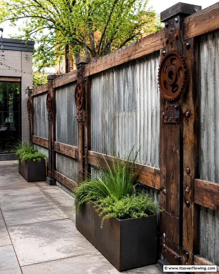 Vintage Industrial Fence - 30 Decorative Fence Ideas to Enhance Your Yard’s Aesthetic