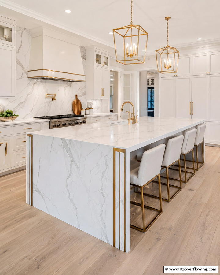 Waterfall Island with Metallic Accents - 20 Stunning Waterfall Kitchen Island Ideas for a Modern Look