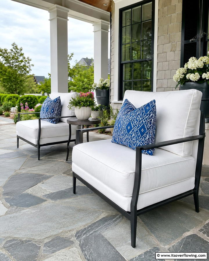 Weather Resistant Fabric Seating - 30 Barndominium Front Porch Ideas for Rustic Charm