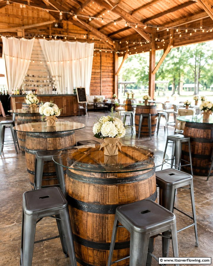 Whiskey Barrel Tables - 25 Western Wedding Ideas for a Rustic Celebration