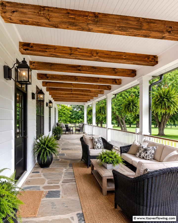 White Farmhouse with Wrap around Porch and Wooden Ceiling Beams - 20 White Farmhouse With Wrap-around Porch Ideas