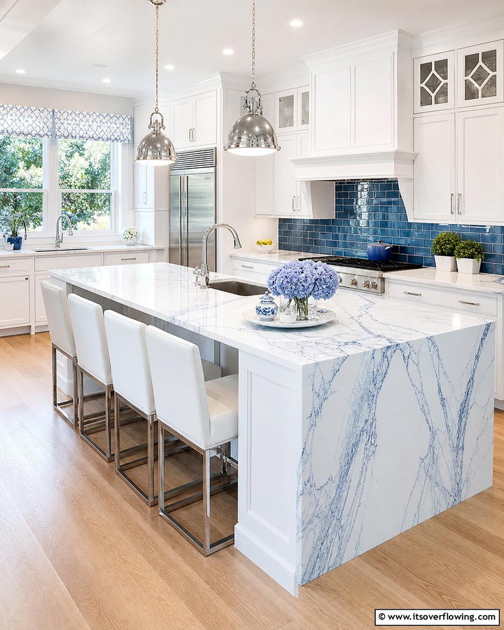 White Marble Countertops with Blue Veining - 25 Blue and White Kitchen Ideas for a Fresh and Timeless Look