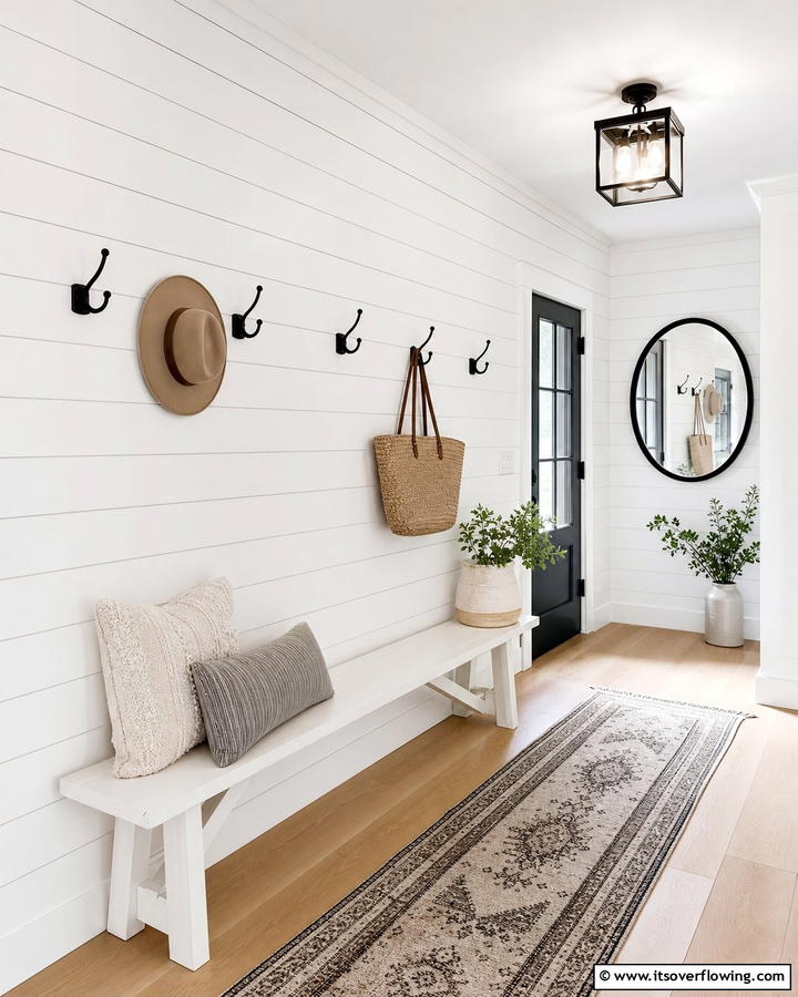 White Shiplap Walls with Black Hooks - 20 Black and White Entryway Design Ideas for a Chic Look