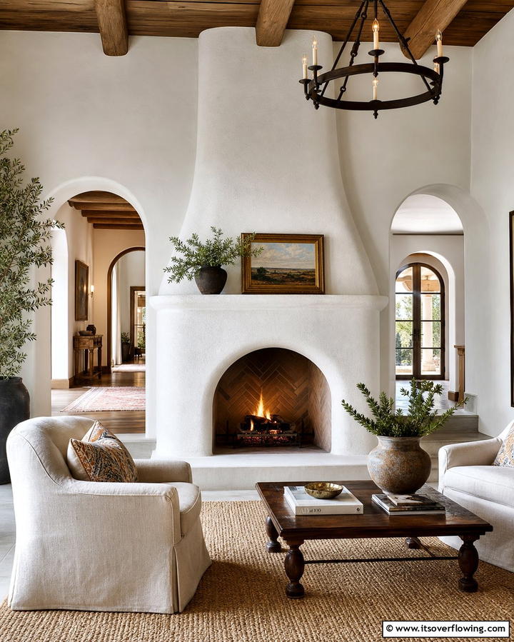 White Stucco Fireplace with Arched Opening - 25 Spanish Style Fireplace Ideas for Cozy Living Spaces