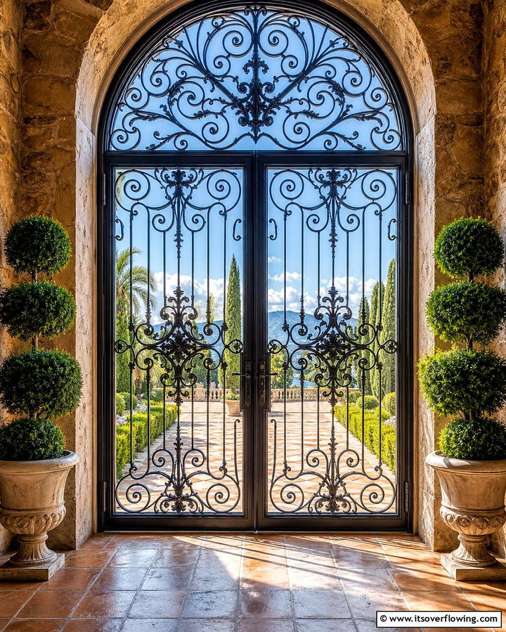 Wrought Iron Grilles Over Glass - 25 Mediterranean Front Door Ideas for a Warm Welcome