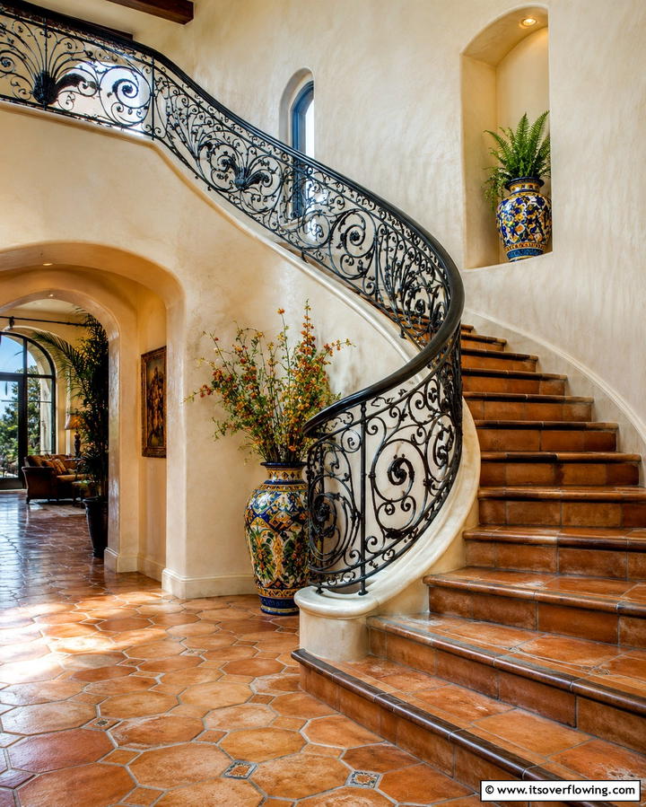 Wrought Iron Railings for Artistic Detail - 30 Elegant Curved Staircase Designs to Elevate Your Home’s Style